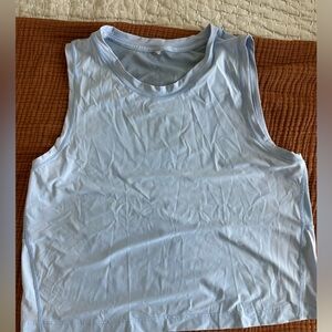 Athleta crop top tank. See thru in back. See pics for wear